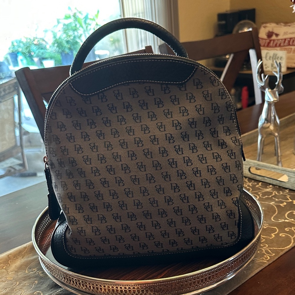 Authentic Dooney & Bourke black and gray backpack. Y2K, vintage.